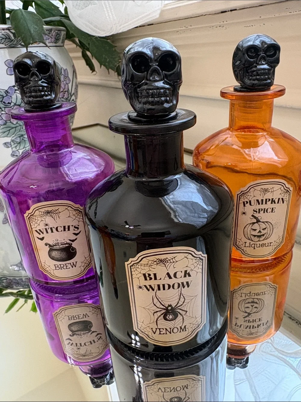 Spooky Halloween-themed Apothecary Glass Bottle Décor & Skull Dish & Hand Pick 1